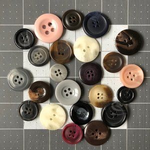 23 Assorted Buttons, Varying Colors and Sizes